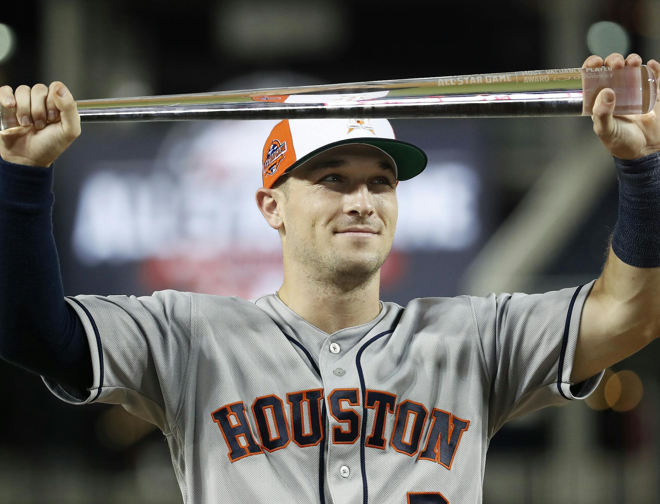MVP Houston Astros Alex Bregman holds the trophy after the 89th MLB baseball All-Star Game, Wednesday, July 18, 2018, at Nationals Park, in Washington. The American League won 8-6. (AP Photo/Alex Brandon)