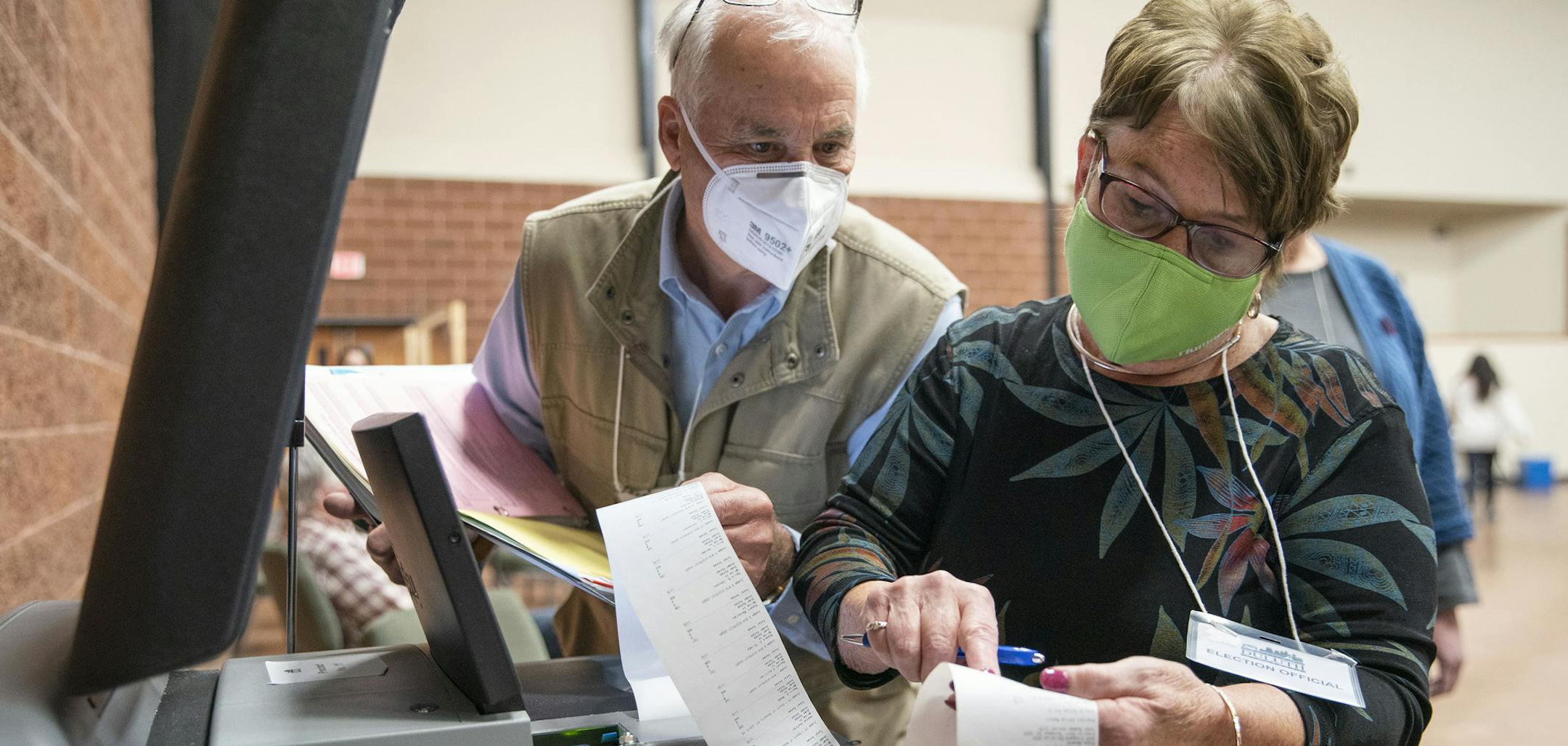 Polling judges in Duluth read off in-person ballot counts after polls closed on Election Day.