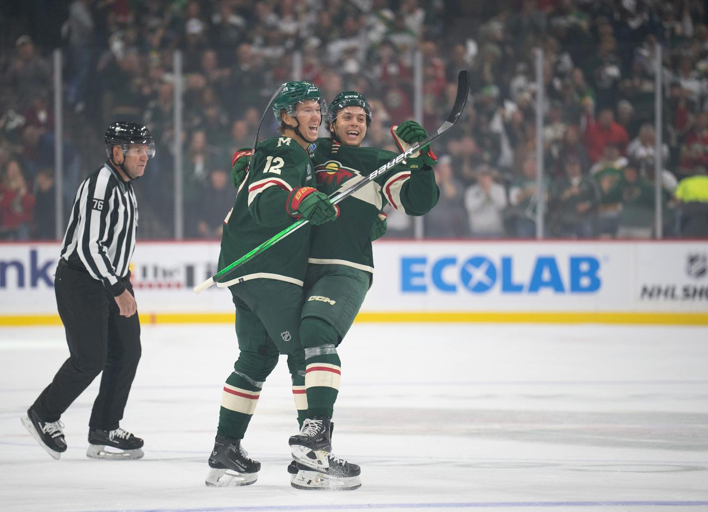 Wild left wing Matt Boldy, left, helped defenseman Brock Faber celebrate his first NHL goal in the first period Thursday.