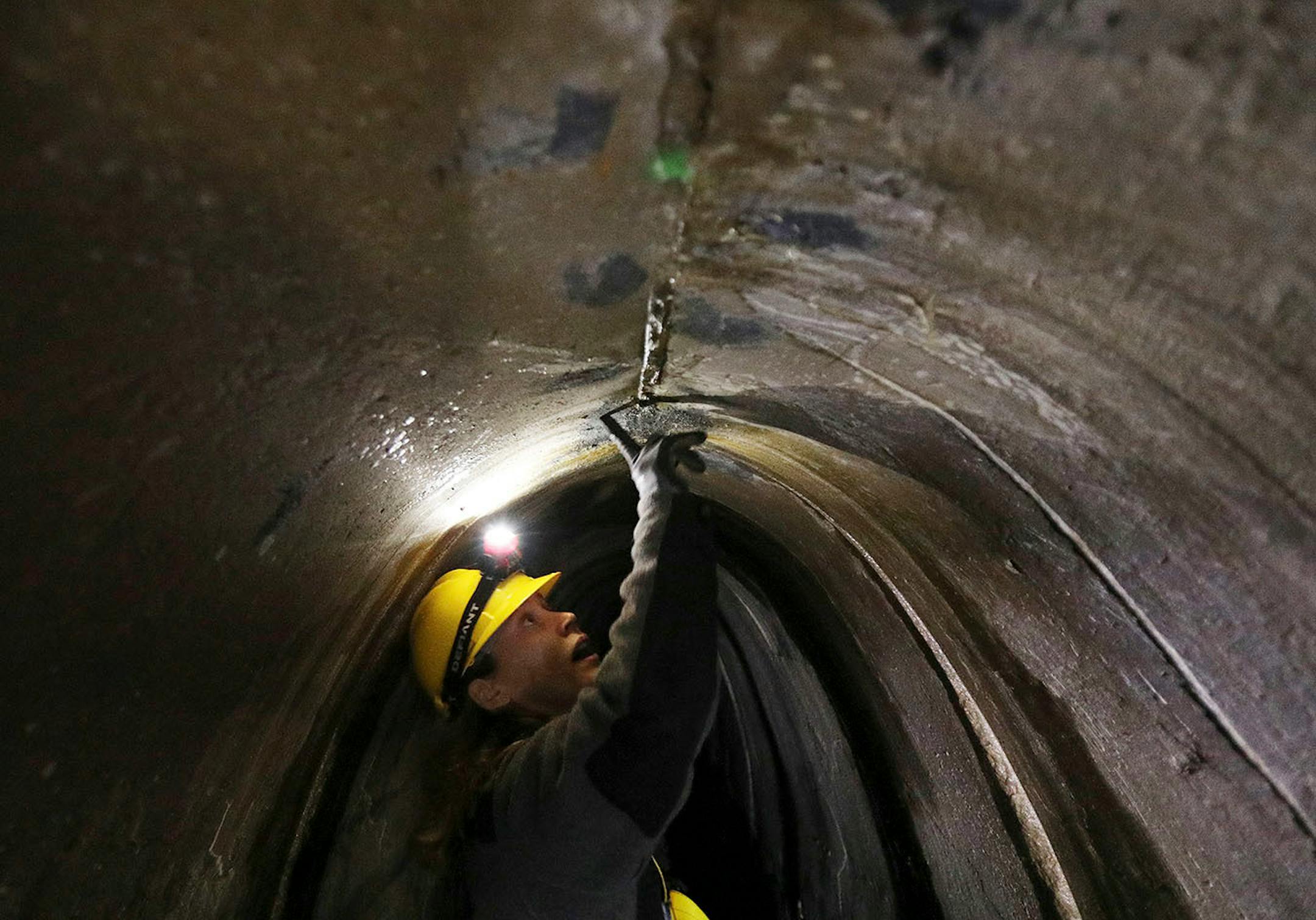 Katrina Kessler, director of Surface Water and Sewers for the Minneapolis Public Works Department, pointed out damage to part of the city's storm sewers in the northeast during a tour underground.
