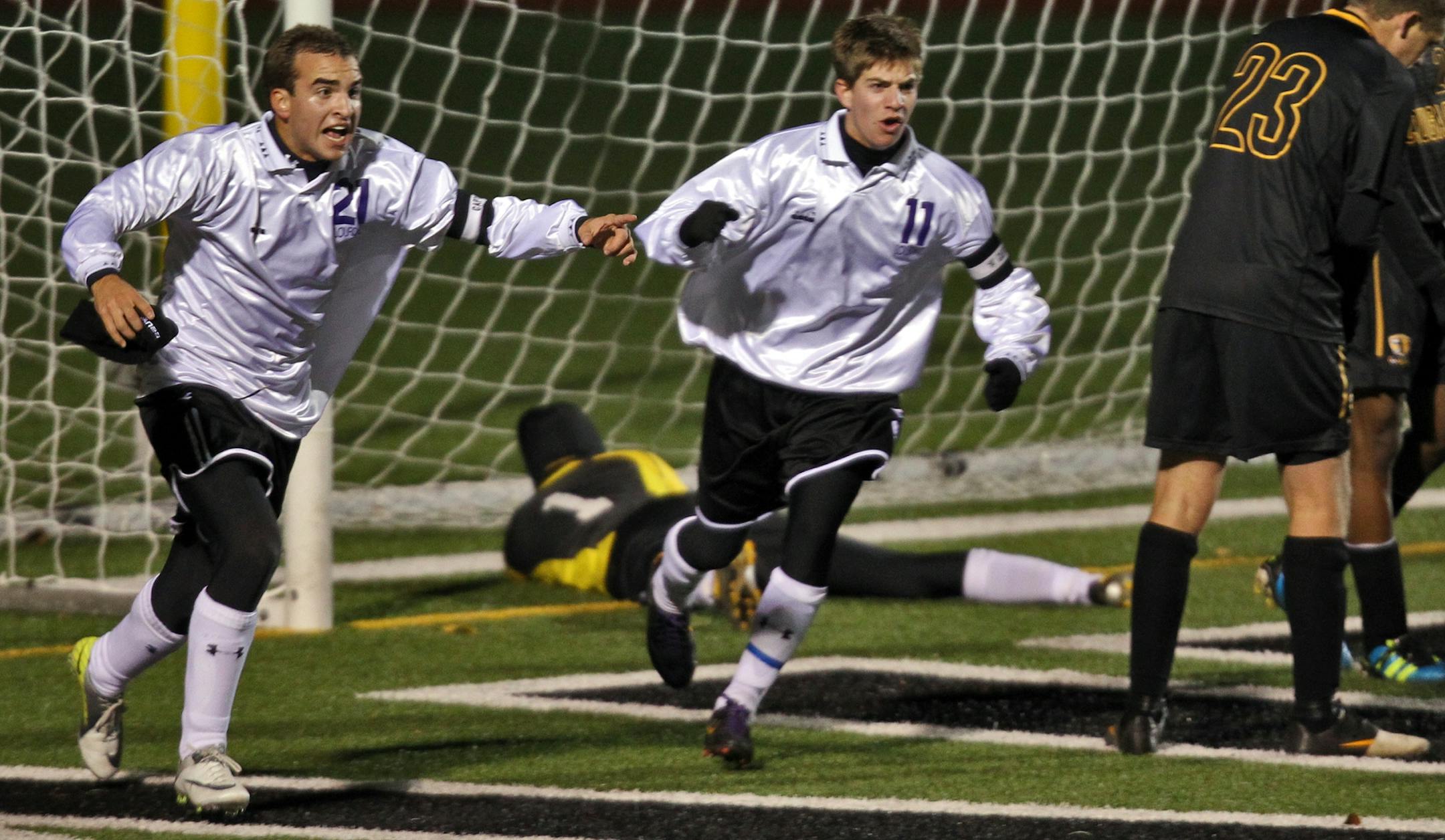 Lourdes players Karl Krecke, left, and Alan Schembri-Wismayer celebrated after Krecke scored a goal in first half action.