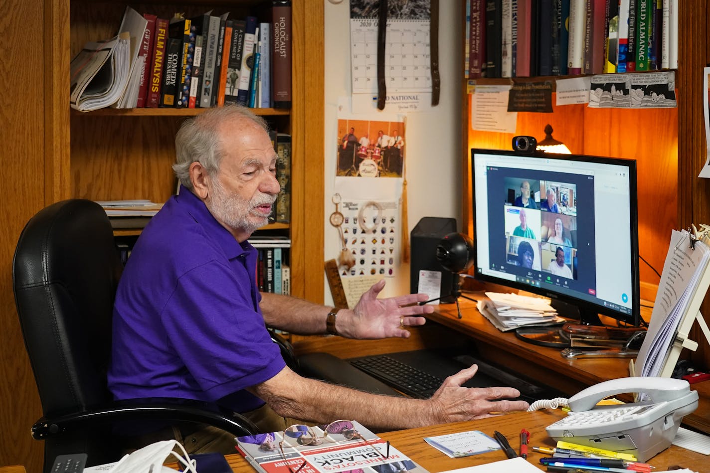 Alan Miller prepared to host an episode of 'Access to Democracy.' The interview series which was recorded in the studio at Thomson Reuters, is now produced via video interviews from the basement of the Millers' home.