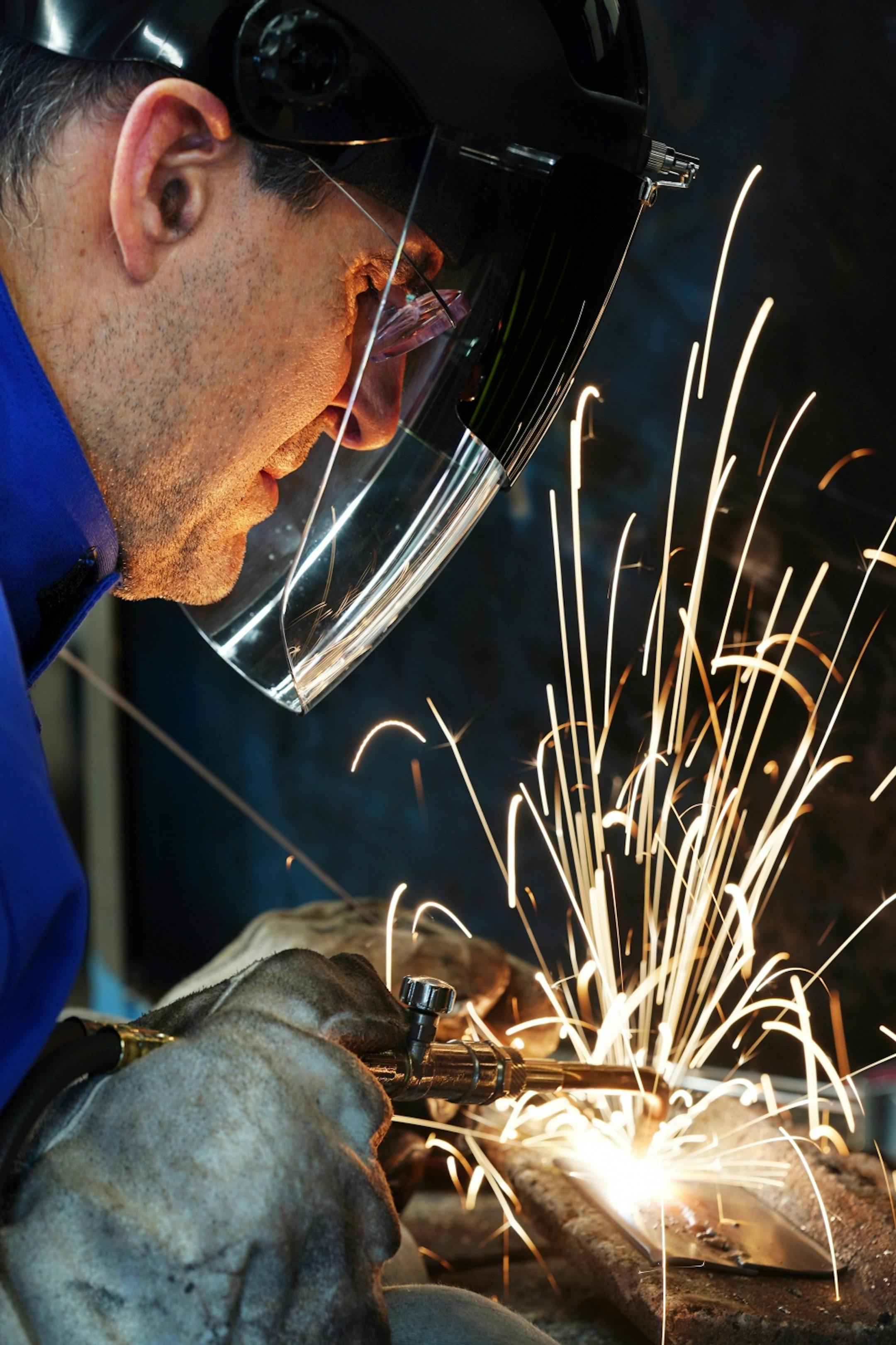 Chris Lucas of Red Wing, who moved to the town from California specifically to enroll in the Bicycle Design and Fabrication program, practiced his welding technique.