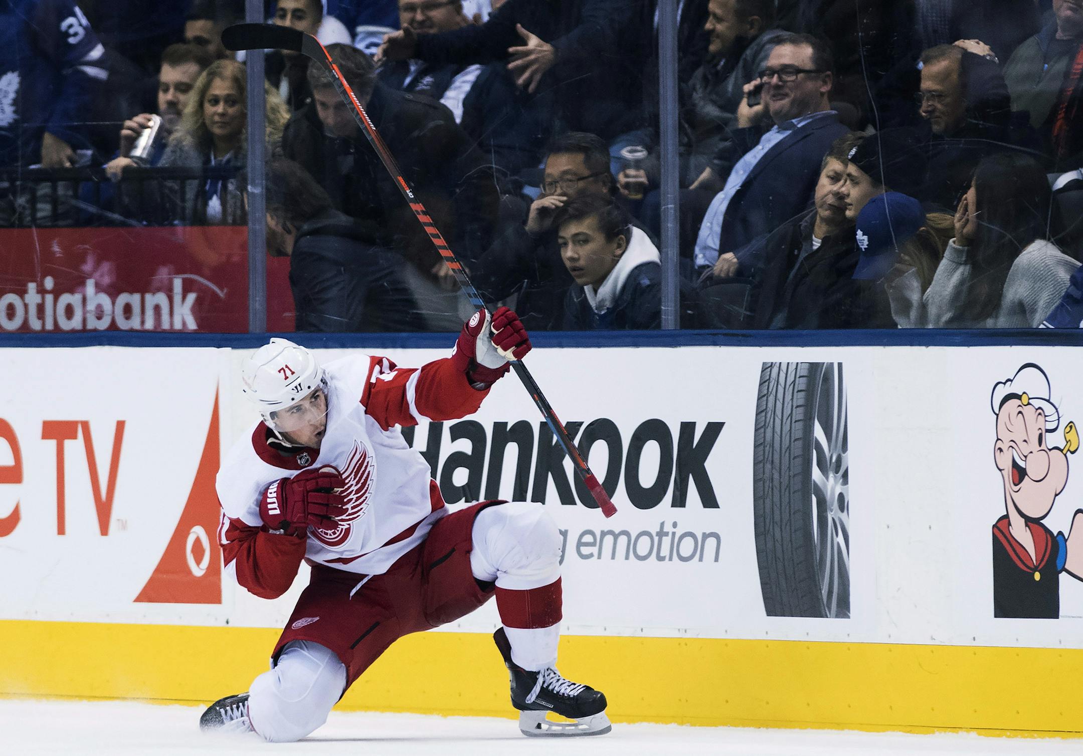 Detroit Red Wings center Dylan Larkin (71) reacts after scoring in overtime NHL against the Toronto Maple Leafs in Toronto on Thursday, Dec. 6, 2018. (Nathan Denette/The Canadian Press via AP)