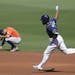 Tampa Bay Rays Manuel Margot rounds the bases past Houston Astros' Jose Altuve after hitting a three run home run against Houston Astros starting pitc