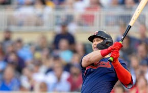 Ryan Jeffers (27) of the Minnesota Twins hits a double in the second inning Wednesday, June 22, 2022, at Target Field in Minneapolis, Minn. ] CARLOS G