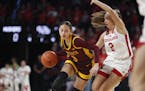 The Gophers' Amaya Battle (3) attempted to get past Nebraska's Logan Nissley (2) on Saturday, Feb. 24, 2024, in Lincoln, Neb. (Gophers athletics)
