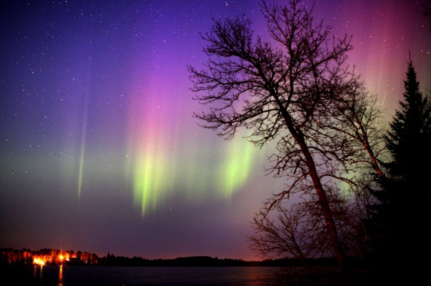 Recent solar activity has presented the patient observer with some of the best viewing since 2004. This photo of the northern lights over Lake Elora in central St. Louis County was taken March 17, 2012.