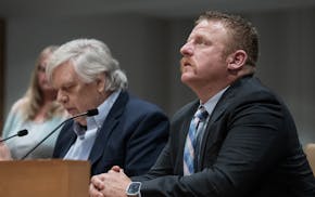 Tim Morin looked upwards as Don Ferber, father of victim Shawn Ferber, vouched for Morin when the Board of Pardons weighed clemency at the Senate Offi