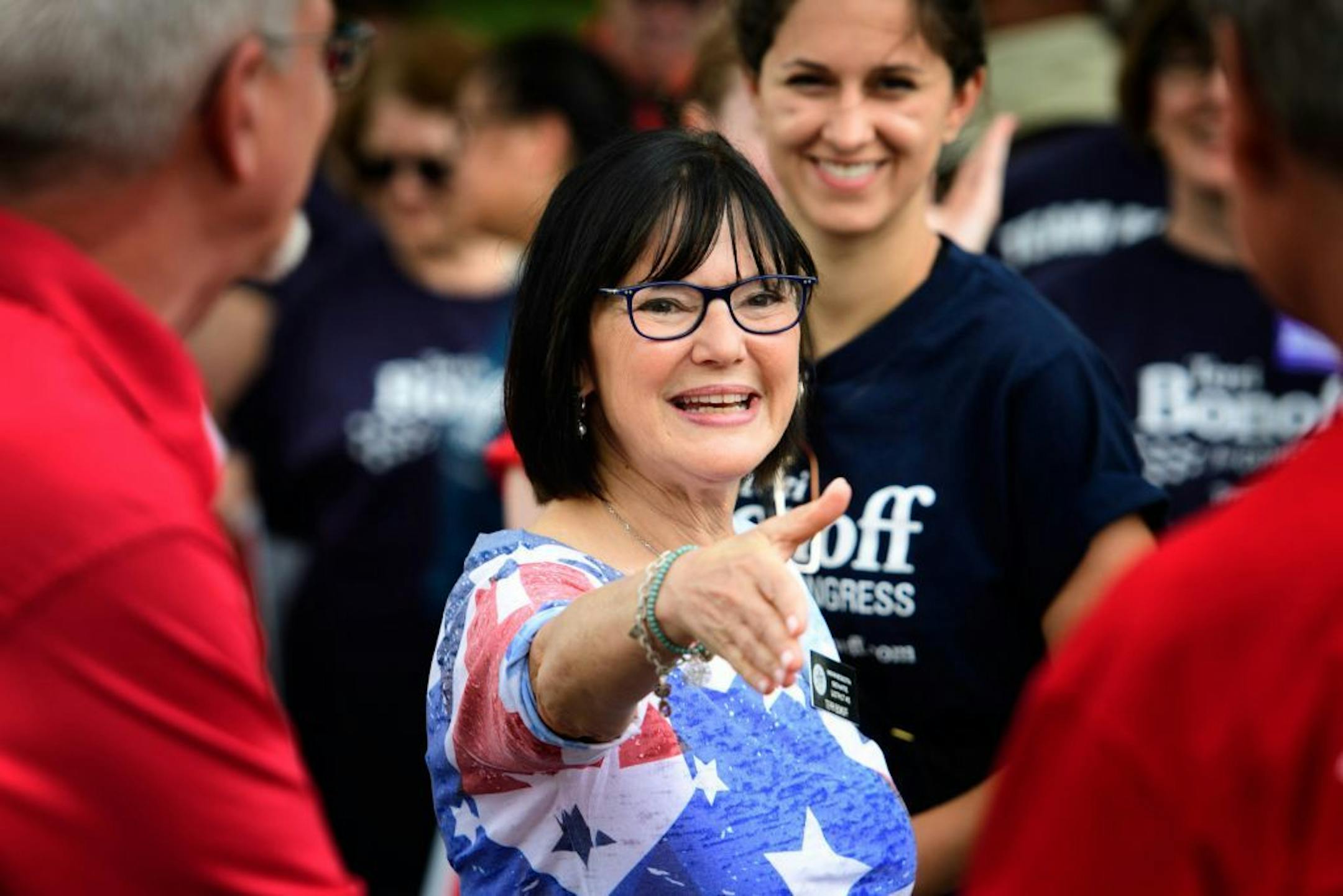 DFL State Senator Terri Bonoff greeted people at the Edina Fourth of July parade. Her opponent, incumbent Republican Congressman Erik Paulsen also marched in the parade.