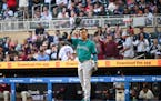 Jorge Polanco doffs his helmet to the Target Field crowd before his first at-bat in Minneapolis as a member of the Mariners.