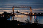 The sun rises over Duluth harbor as seen from Skyline Parkway, a perennial favorite view for sightseers.