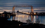 The sun rises over Duluth harbor as seen from Skyline Parkway, a perennial favorite view for sightseers.