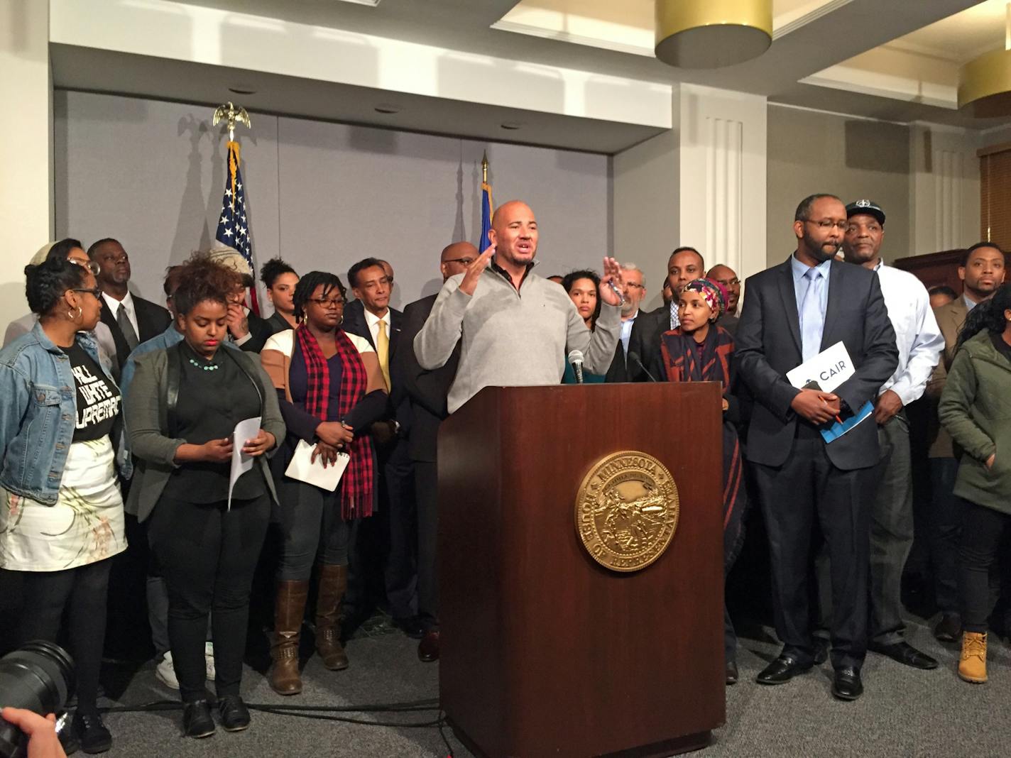 MC Anthony Newby, executive director of Neighborhoods Organizing for Change, at the mic. Black community leaders to unveiled "United Black Legislative Agenda" at a 1:30 p.m. press conference - their proposal for how to spend $100 million that Gov. Dayton has proposed to shrink racial economic disparities.