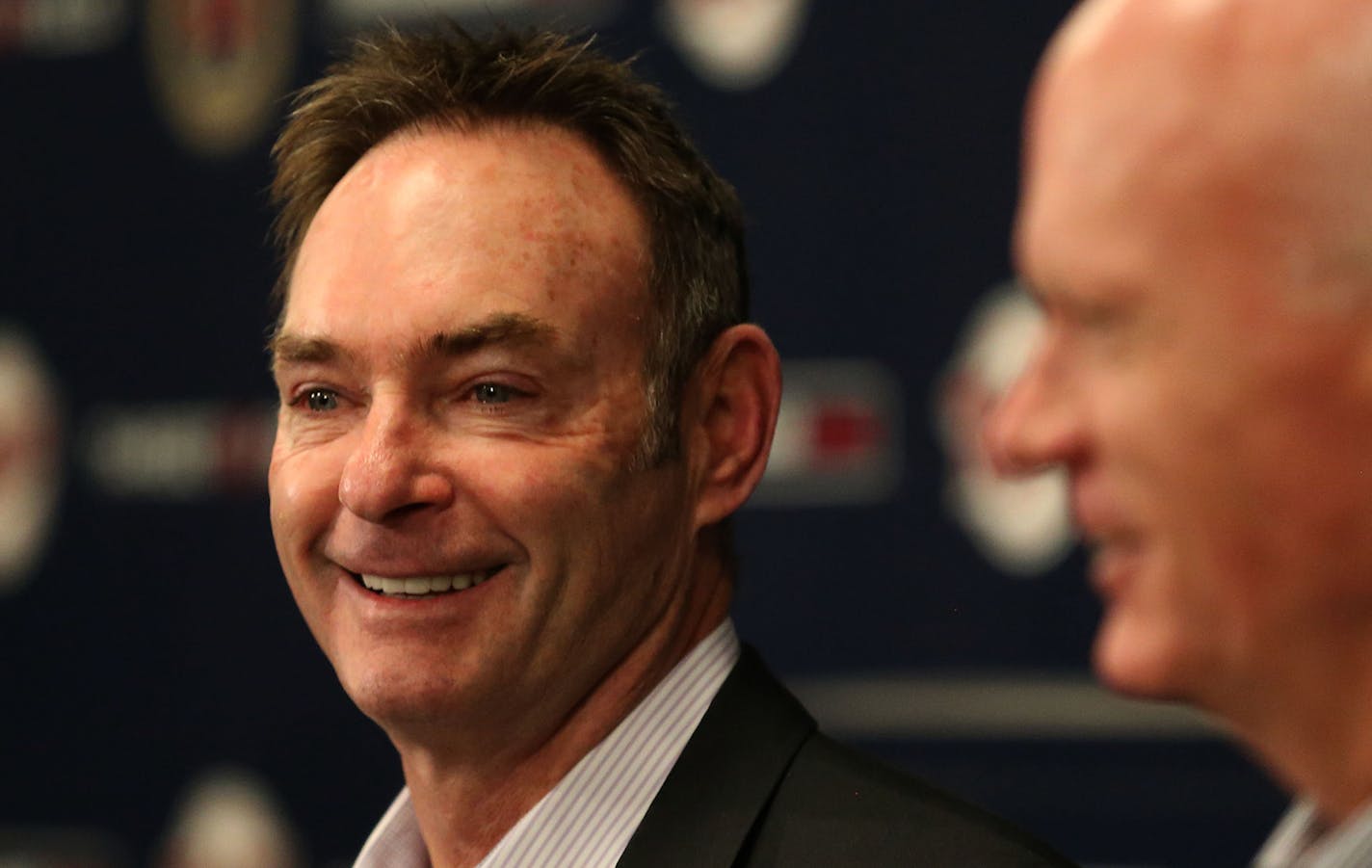 New Twins manager Paul Molitor smiled at his family before the start of the Twins press conference. ] (KYNDELL HARKNESS/STAR TRIBUNE) kyndell.harkness@startribune.com Paul Molitor named Twins manager at Target Field inMinneapolis, Min., Tuesday, November 4, 2014.