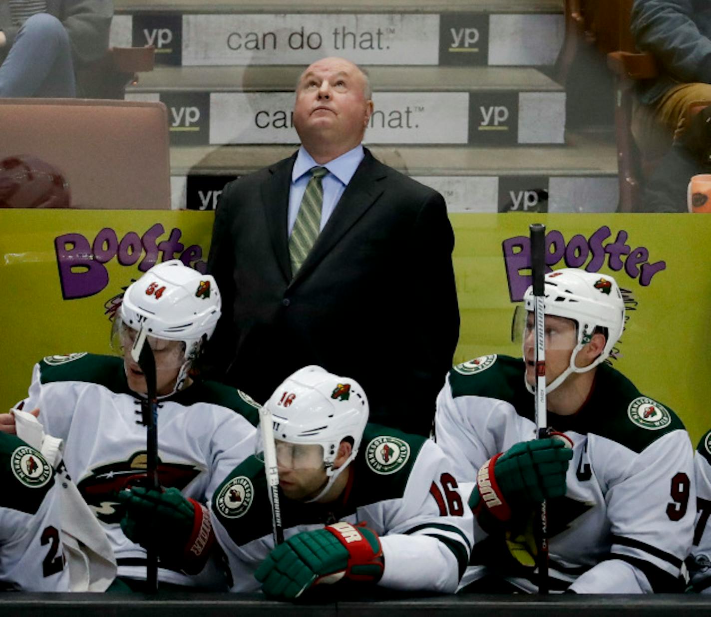 Minnesota Wild coach Bruce Boudreau watches during the third period of an NHL hockey game against the Anaheim Ducks in Anaheim, Calif., Sunday, Jan. 8, 2017. This was the first game back in Anaheim for Boudreau after leaving the Ducks last year. The Wild won 2-1. (AP Photo/Chris Carlson) ORG XMIT: MIN2017013018061766