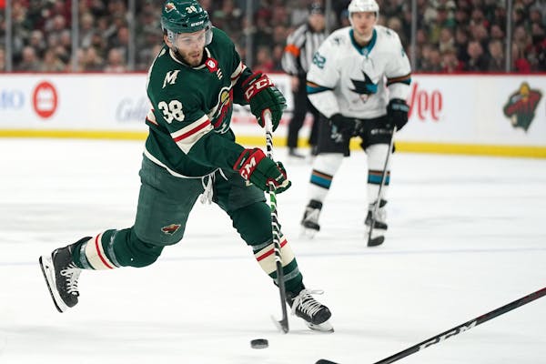 Wild right wing Ryan Hartman took a shot on goal in the first period Saturday vs. the Sharks.