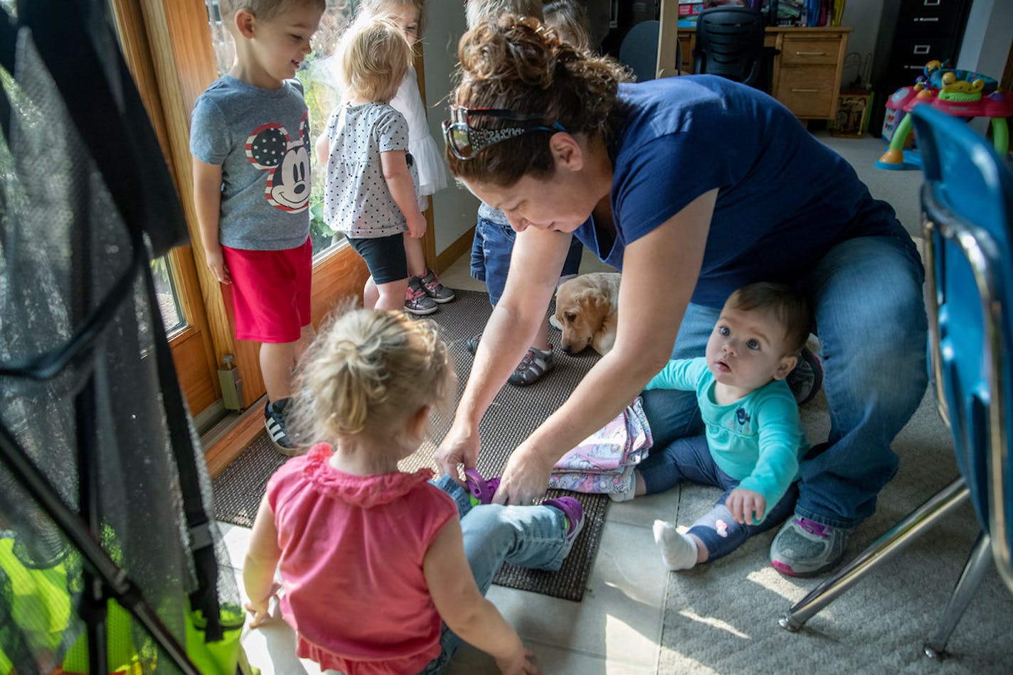 Julie Seydel, who offers child care in her Andover home, said she has discouraged others from doing the same in today's climate.