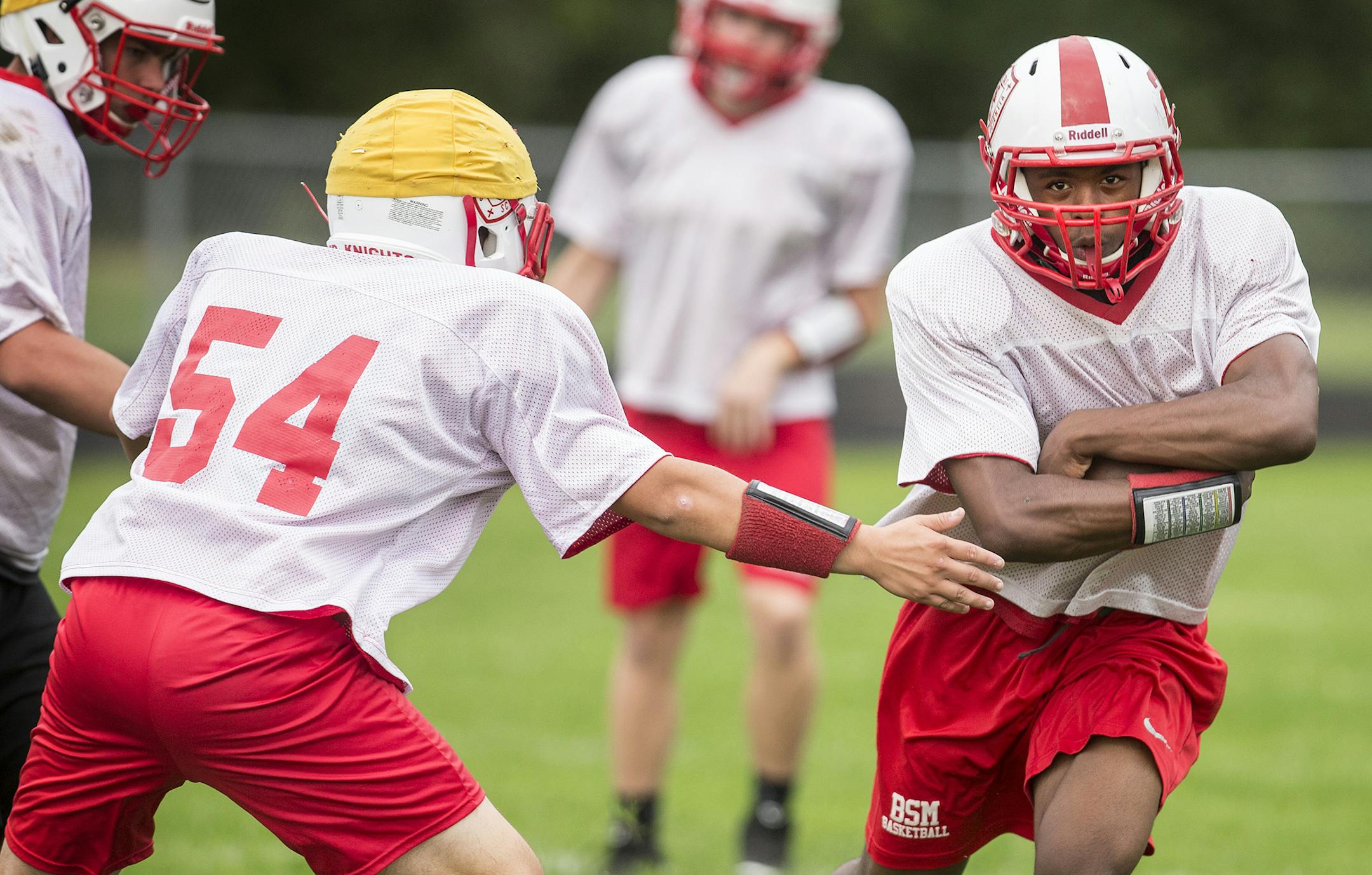 Co-head coach Jon Hanks calls Ricky Floyd the Red Knights “fastest and most elusive kid” in many years. (LEILA NAVIDI/ Star Tribune)