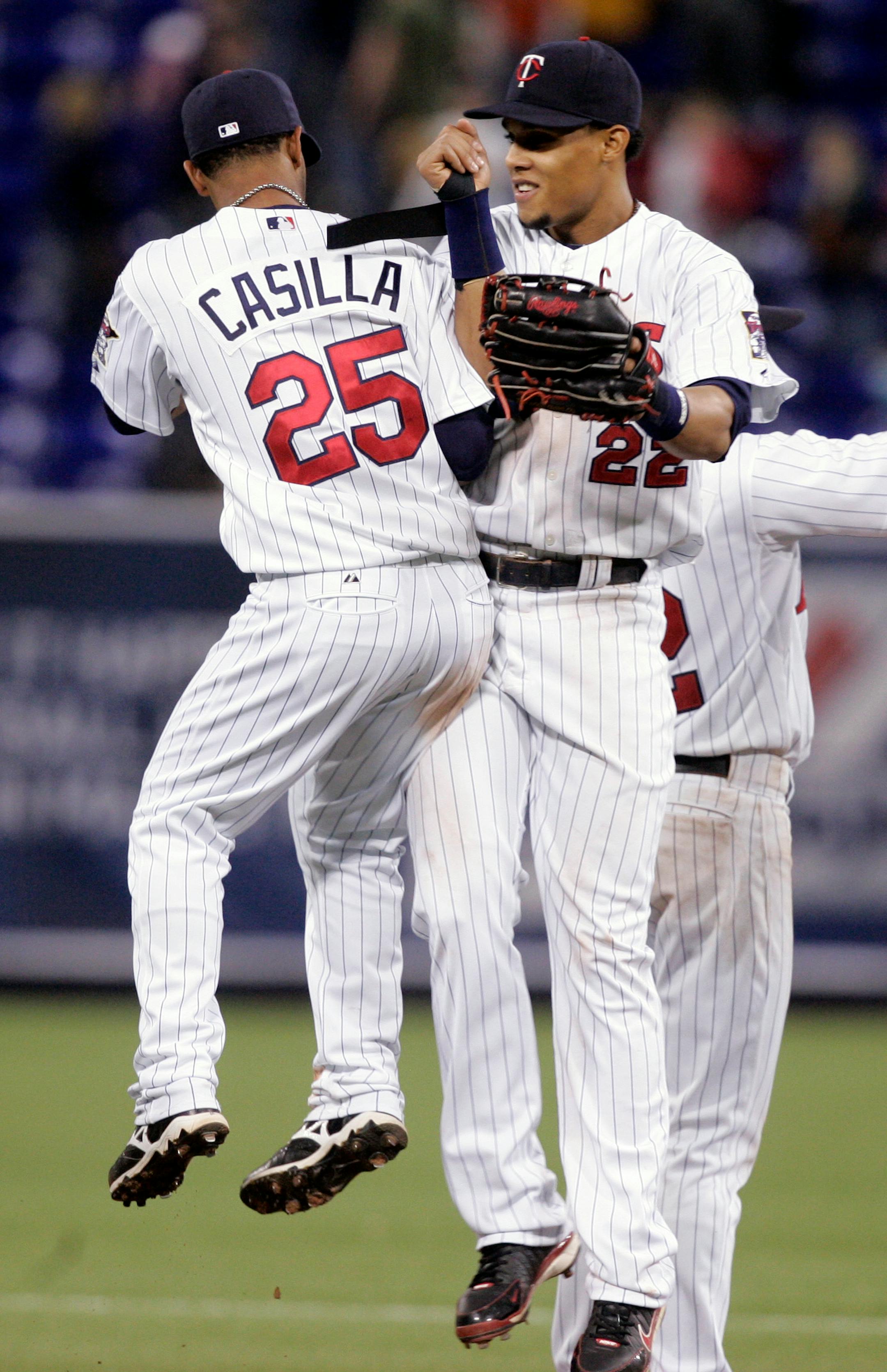 Alexi Casilla, left, and Carlos Gomez are part of the new speed and defense approach for the Minnesota Twins.