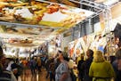 Visitors viewed "Michelangelo's Sistine Chapel: The Exhibition" during a 2016 tour stop in Dallas. (Photo by John H. Parker/SEE Attractions/Bridgeman 