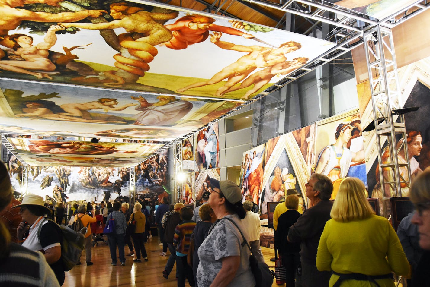 Visitors viewed "Michelangelo's Sistine Chapel: The Exhibition" during a 2016 tour stop in Dallas. (Photo by John H. Parker/SEE Attractions/Bridgeman Images)