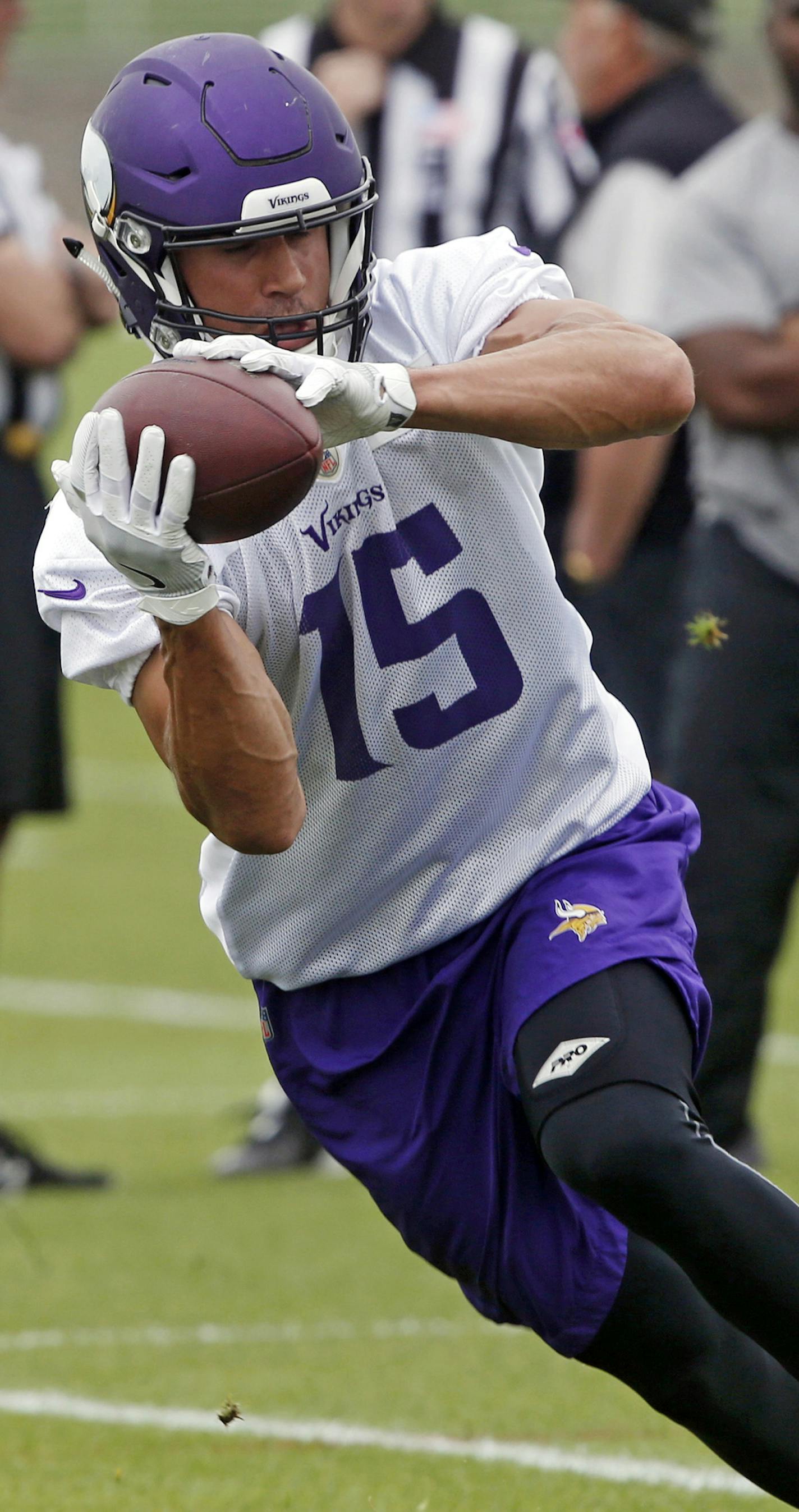 Minnesota Vikings wide receiver Brandon Zylstra receives a pass during practice at the NFL football team's training camp in Eagan, Minn., Tuesday, June 12, 2018. (AP Photo/Jim Mone)