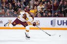 Carl Fish takes a shot for the Gophers against Penn State on Feb. 9 at 3M Arena at Mariucci.