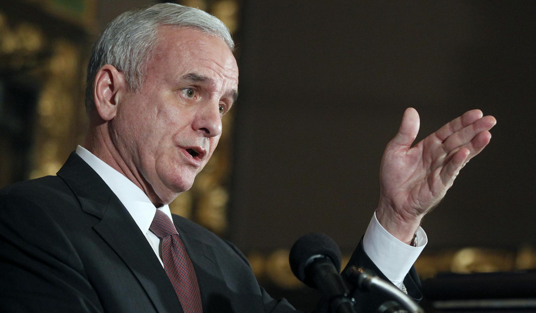 Richard TsongTaatarii/rtsongtaatarii@startribune.com St. Paul, WI;02/28/11;left to right ] At the State Capitol, Gov. Mark Dayton addressed proposed budget revisions for FY2012-2013.