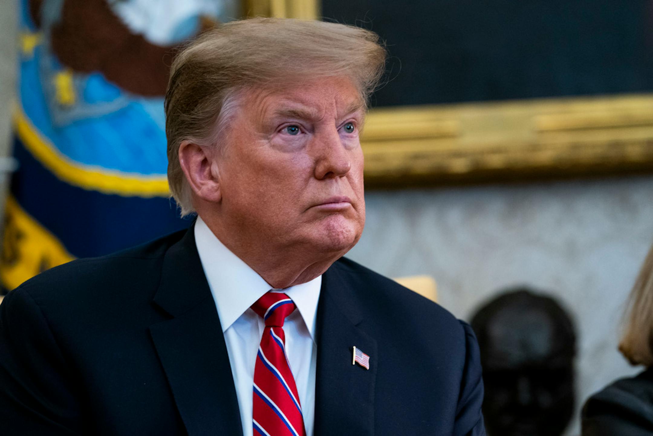 President Donald Trump speaks to reporters during a meeting with President Jair Bolsonaro of Brazil in the Oval Office at the White House, in Washington, March 19, 2019. Trump said on Tuesday that he was "never a fan" of the late Sen. John McCain, "and I never will be." The president's blunt remarks came in response to a reporter's question about his recent attacks on the Republican war hero who represented Arizona, and who died last year of brain cancer. (Doug Mills/The New York Times)