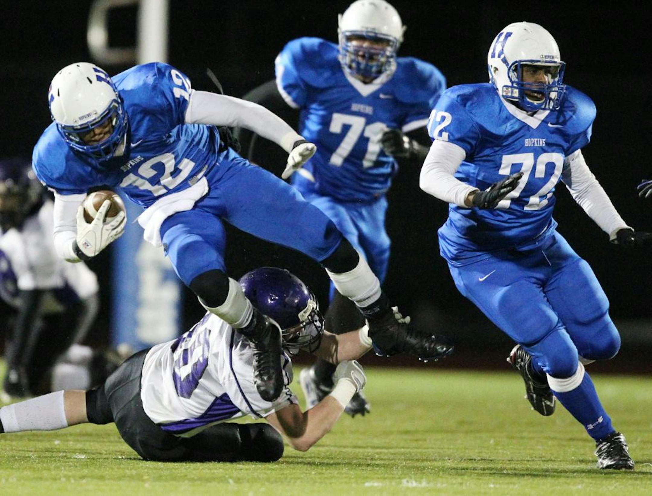 Wide receiver Andre McDonald of Hopkins (12) recommitted to the Gophers on Thursday.