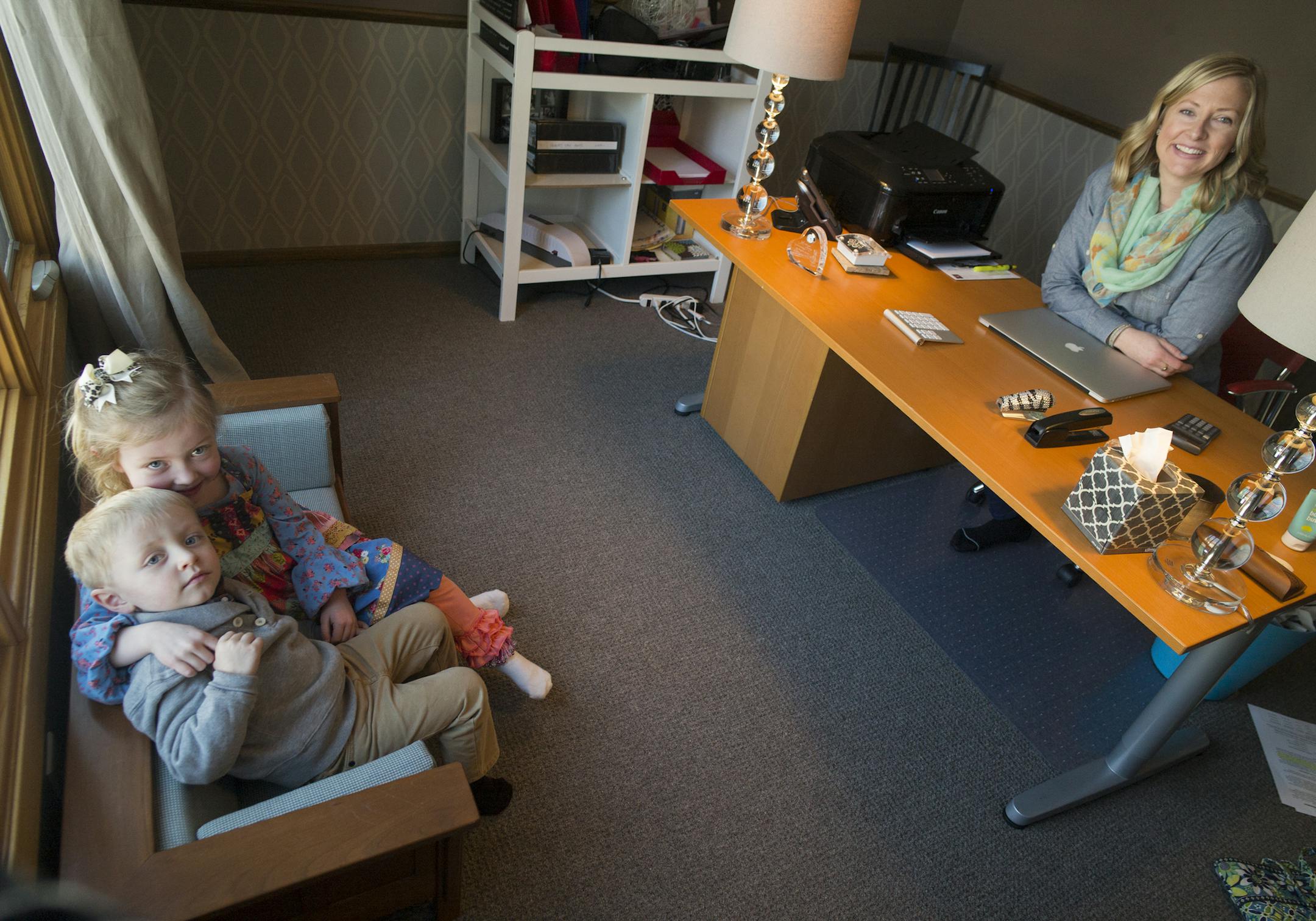 Angela and Ricky Brown show off their remodeled home, the one Ricky grew up in. This is Angela's home office where the childrenAdelaide,5, and Griffin,3 can visit on a small couch for children.]Richard Tsong-Taatarii/rtsong-taatarii@startribune.com
