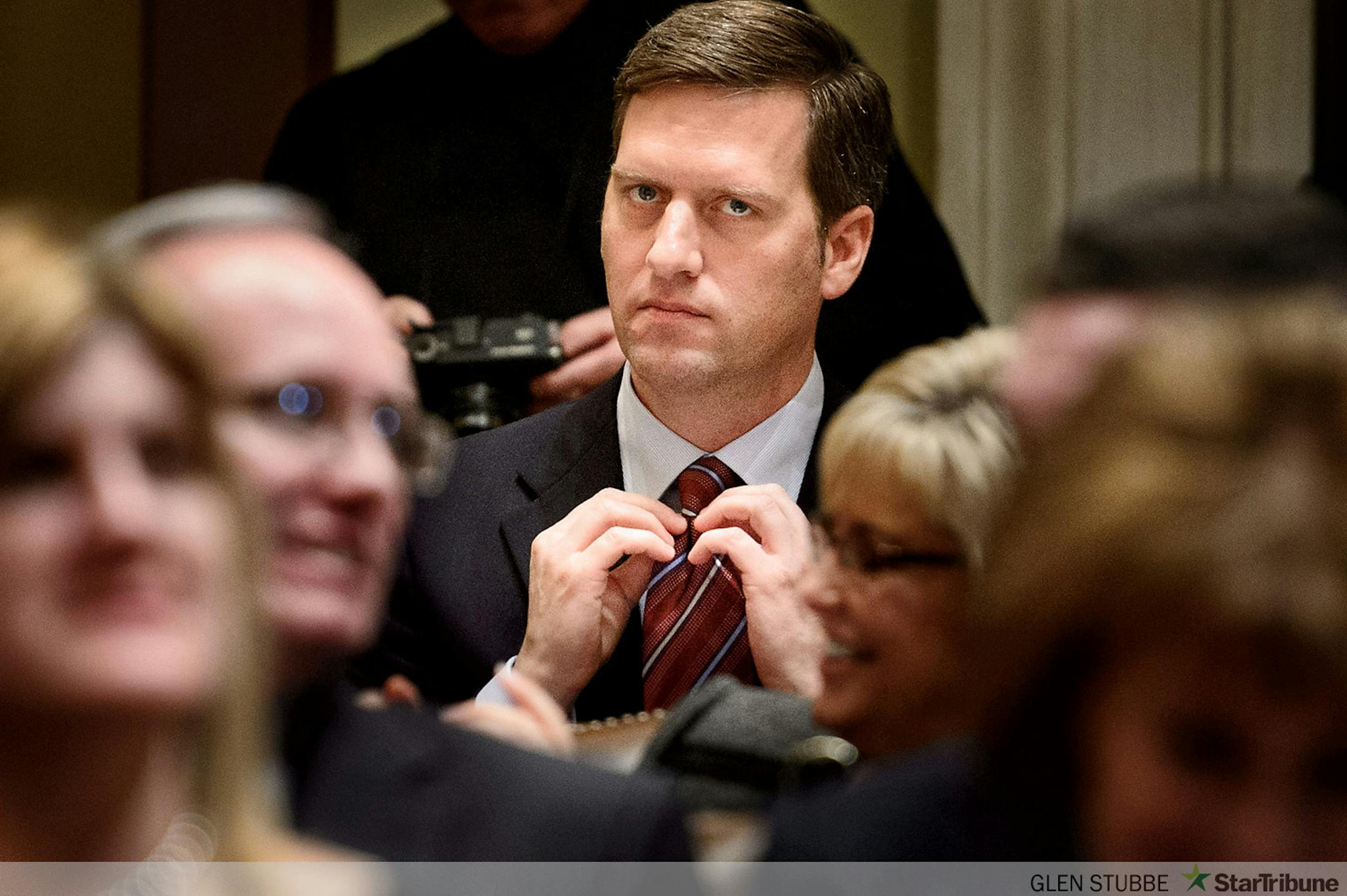 Rep. Kurt Daudt checked his tie as the vote was taken that would elect him House Speaker.   ]   GLEN STUBBE * gstubbe@startribune.com   Tuesday, January 6,  2015  The Minnesota House and Senate re-convene, with much ceremony, family and guests. In the House, Speaker Kurt Daudt will take the gavel back for the GOP.
