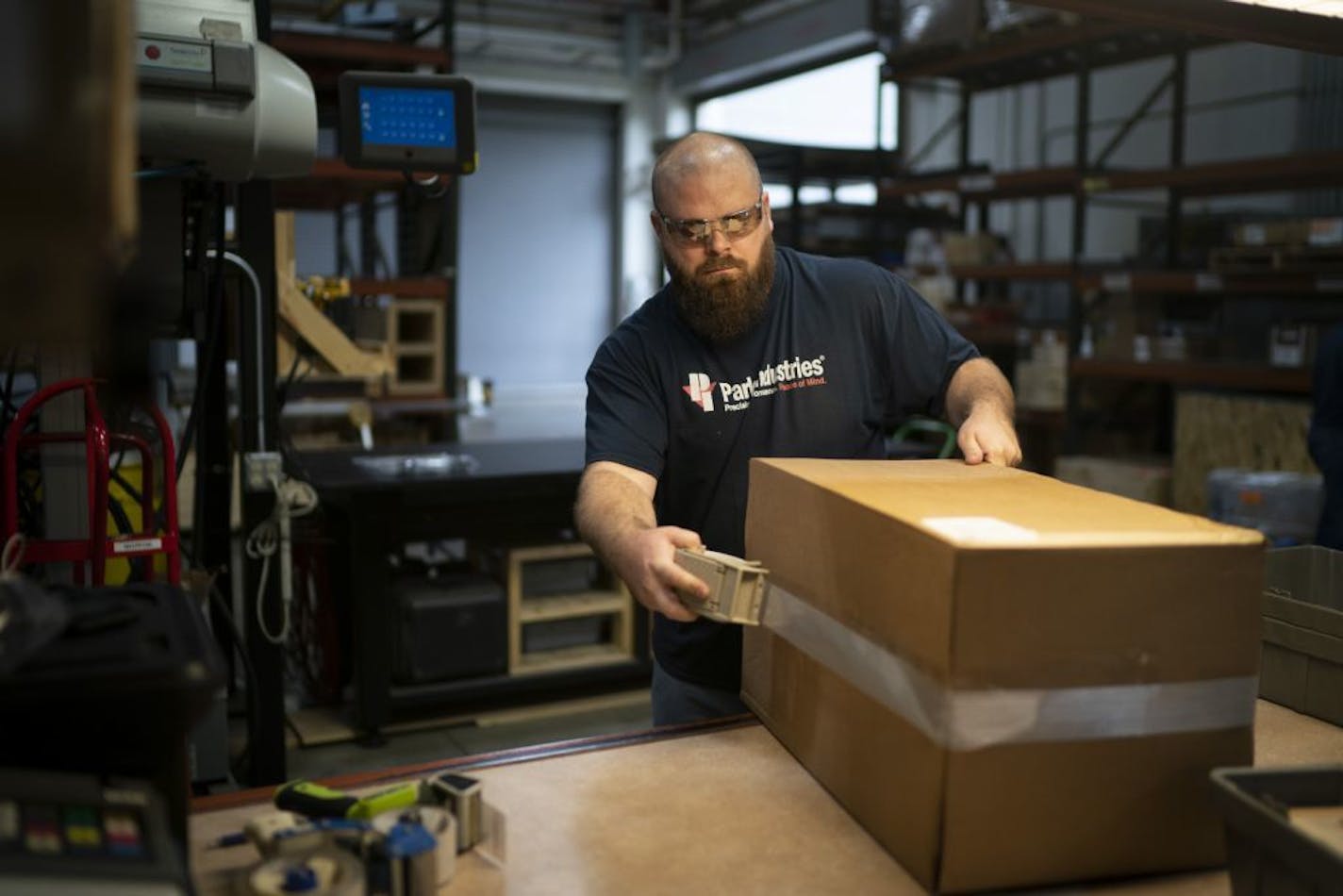 Bryan Rademacher packaged some parts to be shipped at Park Industries in St. Cloud, Minn., on Thursday, September 26, 2019.