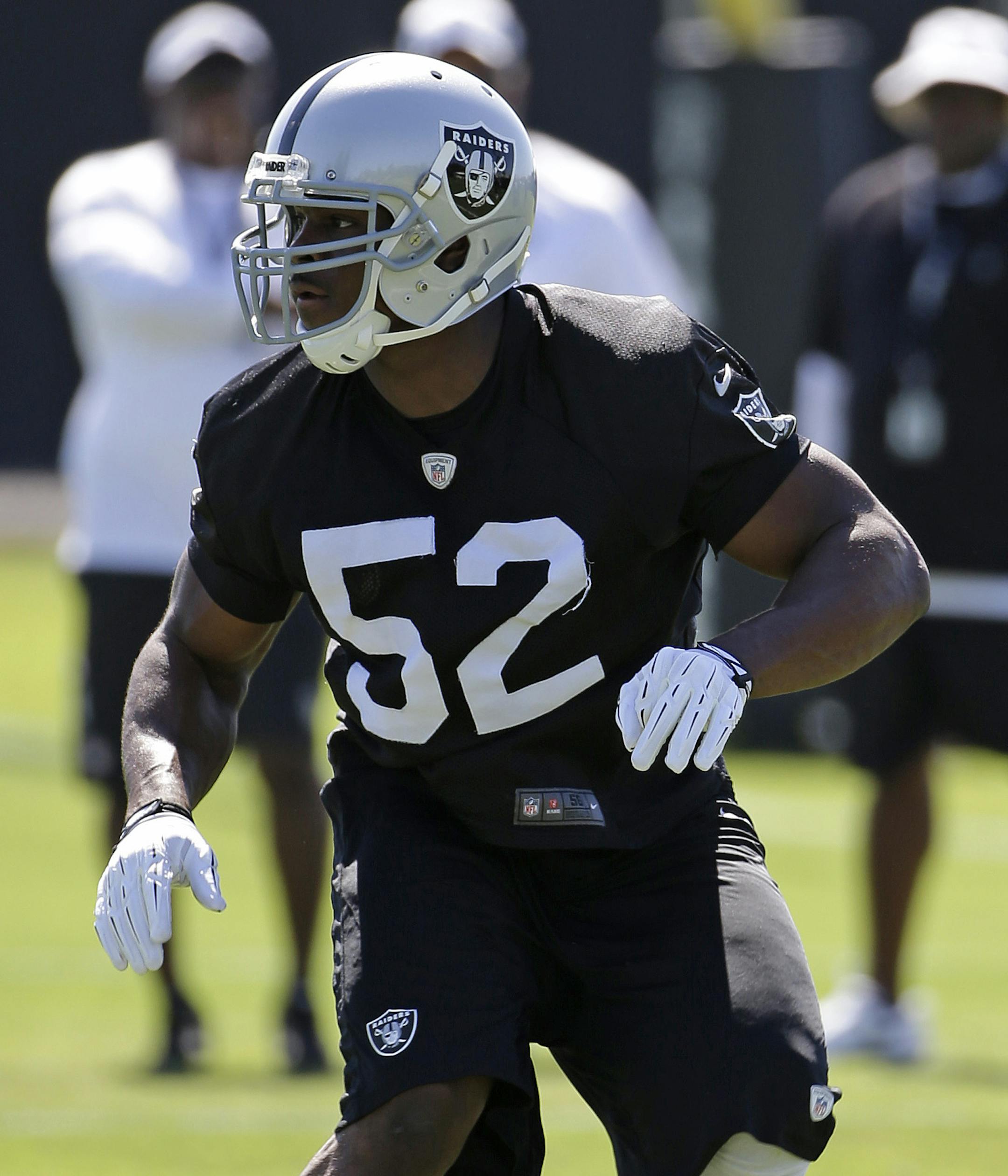 Oakland Raiders outside linebacker Khalil Mack takes part in a drill during their NFL football training camp Friday, July 25, 2014, in Napa, Calif. (AP Photo) ORG XMIT: OTKER