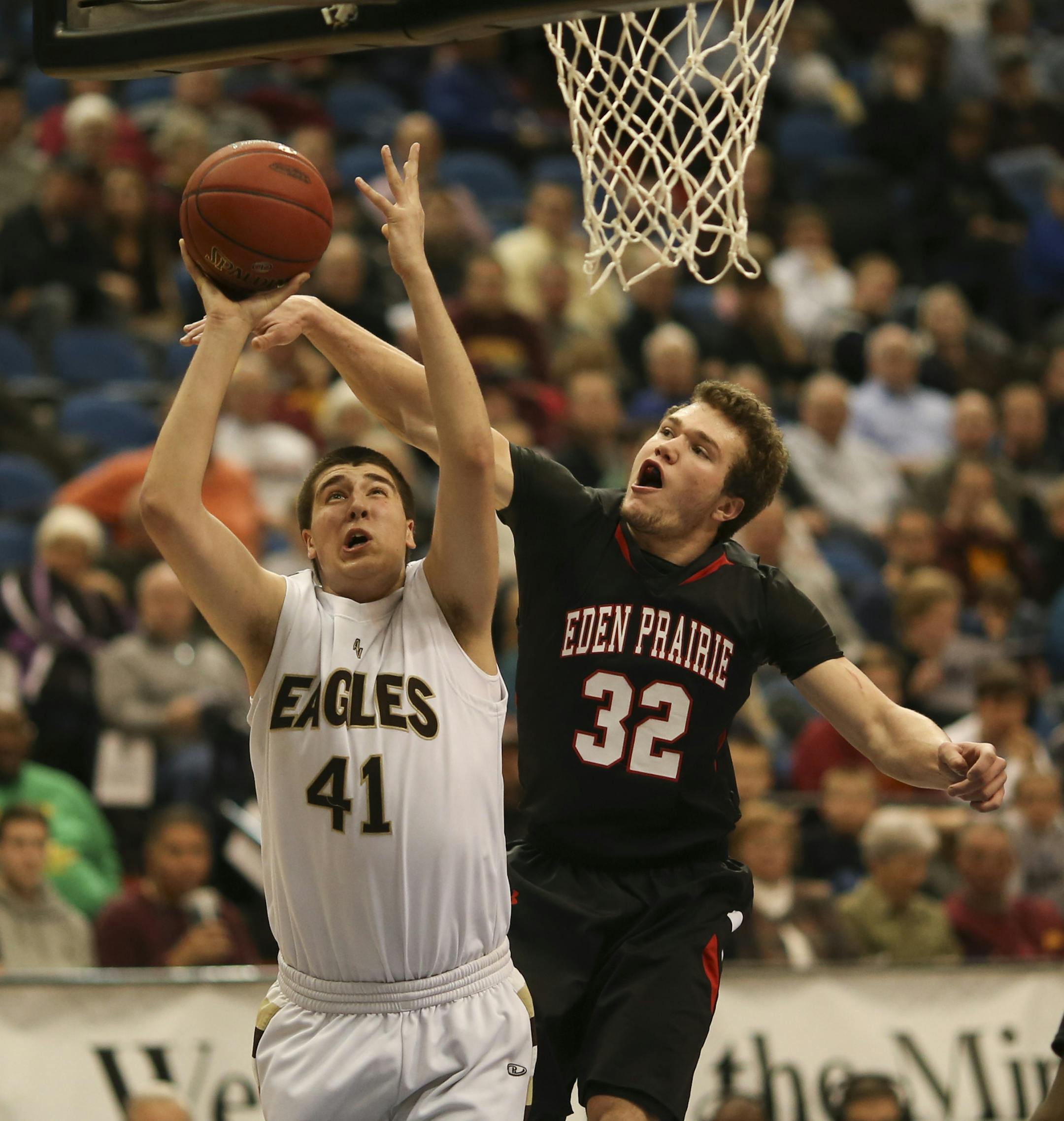 Apple Valley faced Eden Prairie in a Class 4A Boys' Basketball State Tournament semifinal game Thursday night, March 21, 2013 at Target Center in Minneapolis. Apple Valley's Brock Bertram put up a first half shot while defended by Eden Prairie's Jack Cottrell. ] JEFF WHEELER ‚Ä¢ jeff.wheeler@startribune.com