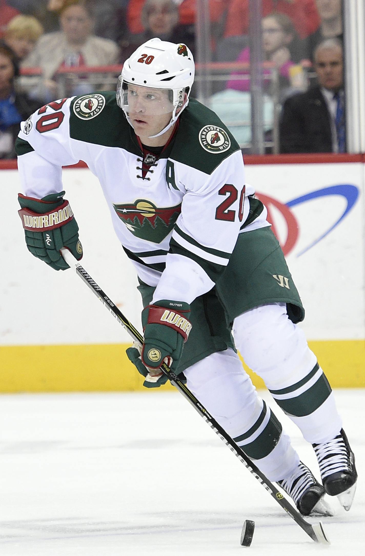 Minnesota Wild defenseman Ryan Suter (20) skates with the puck during the first period of an NHL hockey game against the Washington Capitals, Tuesday, March 14, 2017, in Washington. (AP Photo/Nick Wass) ORG XMIT: VZN10