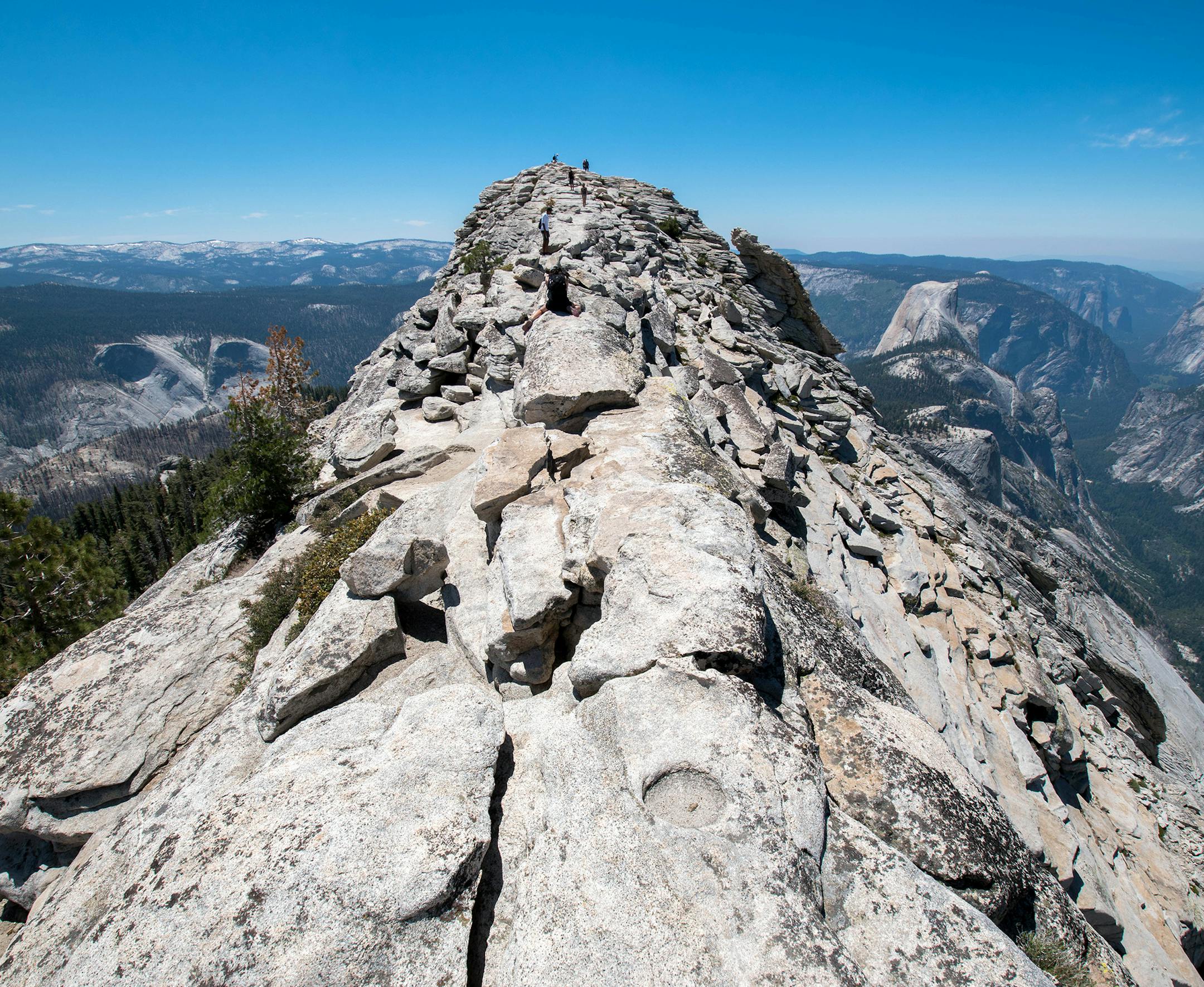 From atop Clouds Rest, a mountain in Yosemite National Parks's high country (elevation 9,900 feet), views take in the park's iconic Half Dome, Yosemite Valley and the Yosemite Wilderness.