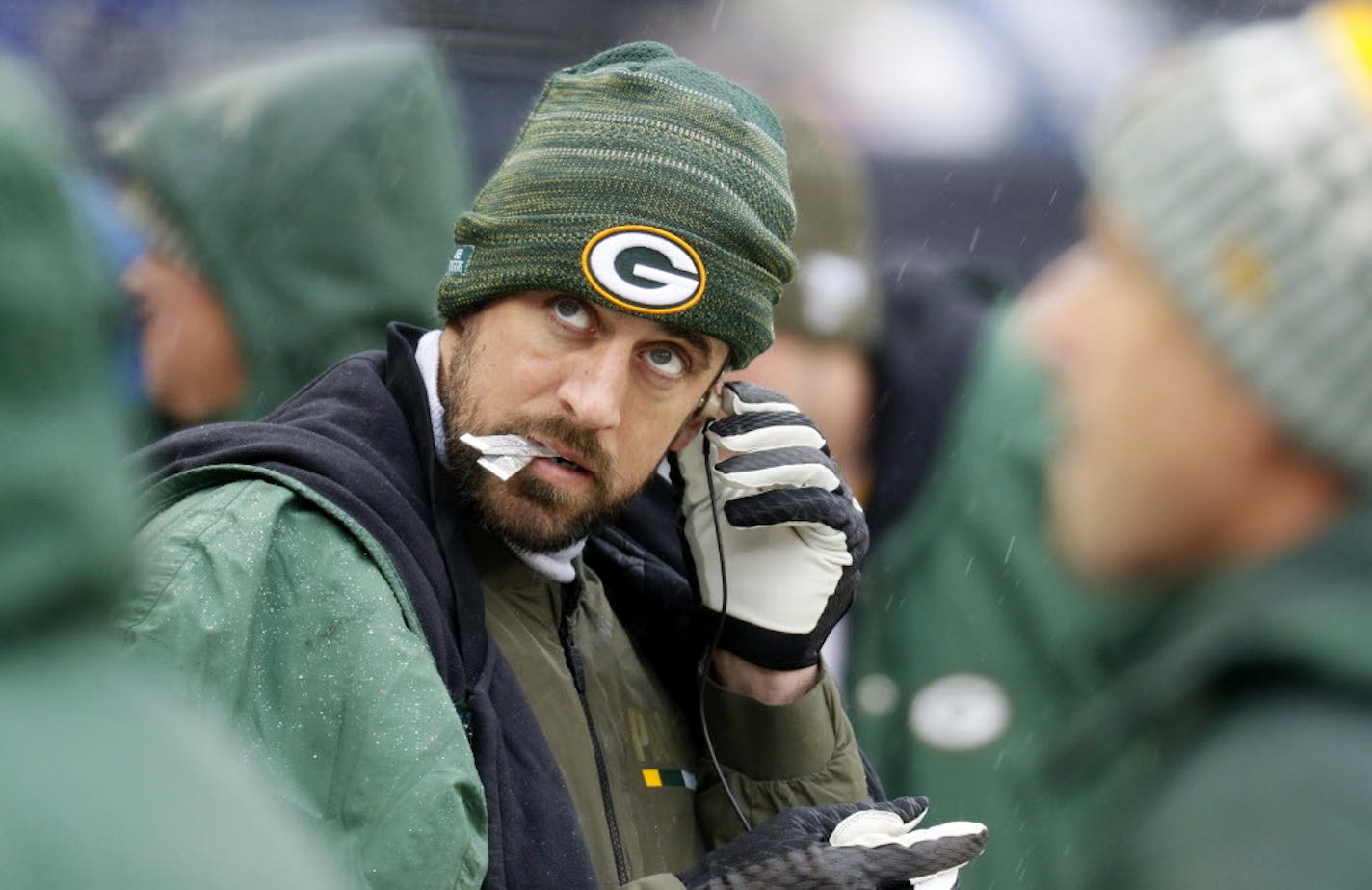 Green Bay Packers quarterback Aaron Rodgers looks at the scoreboard Sunday, Nov. 12, 2017, during an NFL football game against the Chicago Bears in Chicago. (Daniel White/Daily Herald via AP)