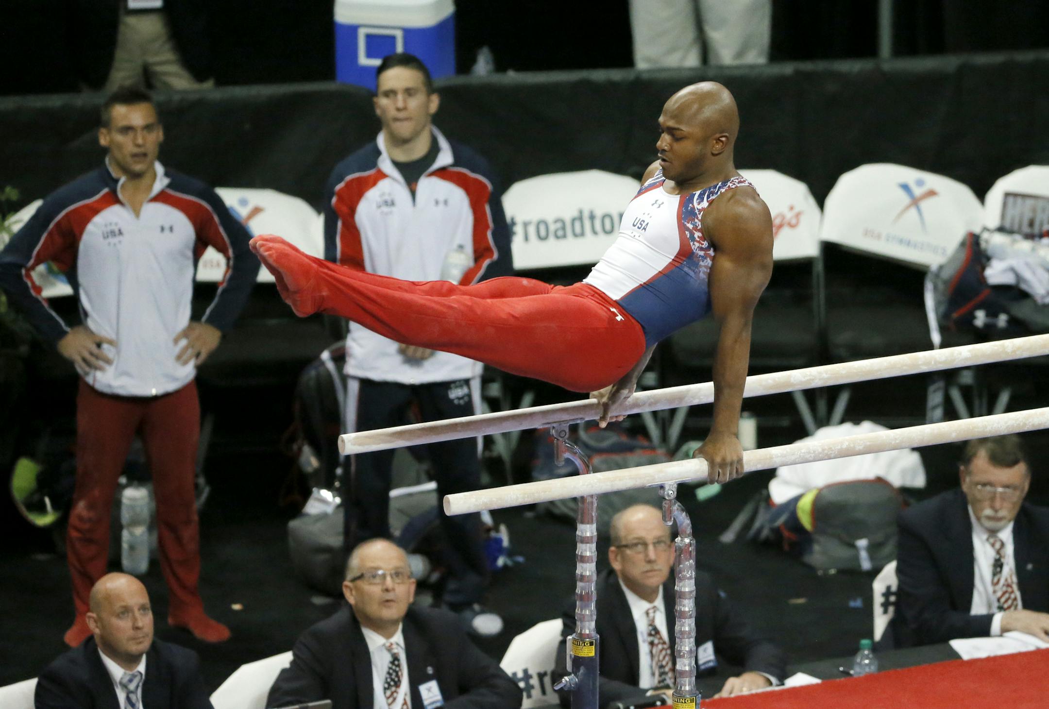 John Orozco competes on the parallel bars during the U.S men's Olympic gymnastics trials, Saturday, June 25, 2016, in St. Louis. (AP Photo/Tony Gutierrez)