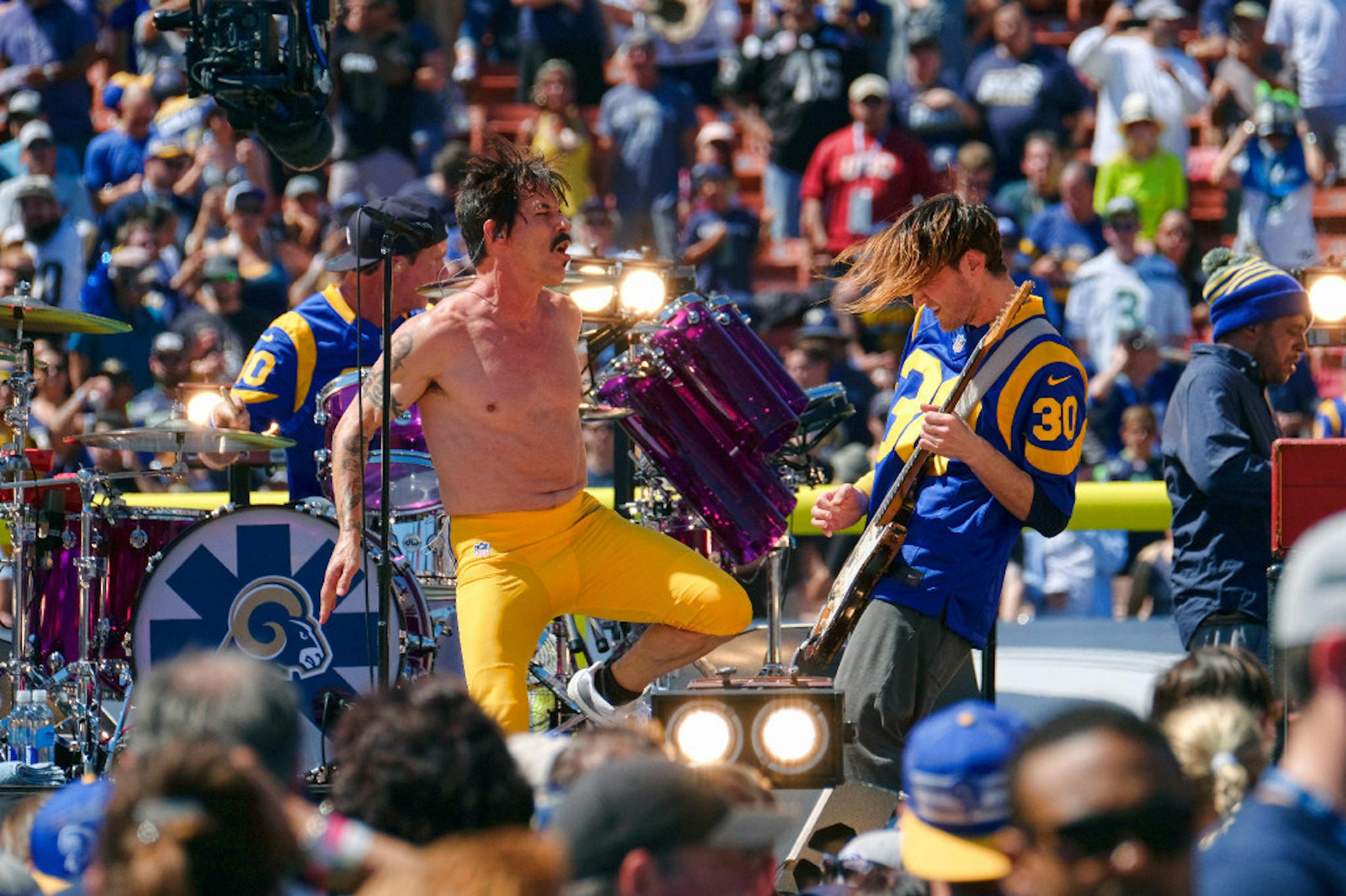 The Red Hot Chili Peppers perform prior to an NFL football game between the Los Angeles Rams and the Seattle Seahawks at the Los Angeles Memorial Coliseum, Sunday, Sept. 18, 2016, in Los Angeles. (AP Photo/Richard Vogel)