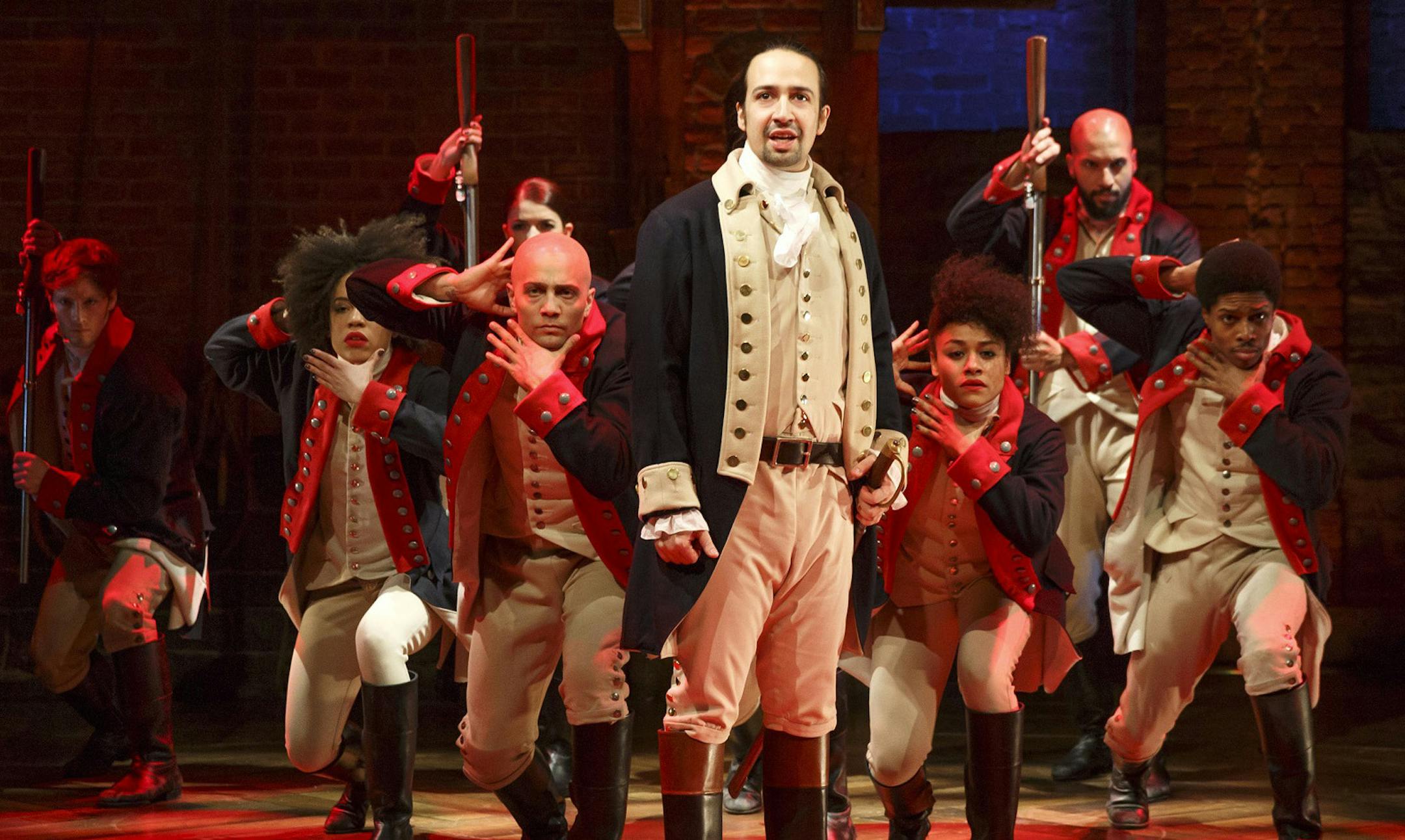 This image released by The Public Theater shows Lin-Manuel Miranda, foreground, with the cast during a performance of "Hamilton," in New York. (Joan Marcus/The Public Theater via AP) ORG XMIT: MIN2016050308352013