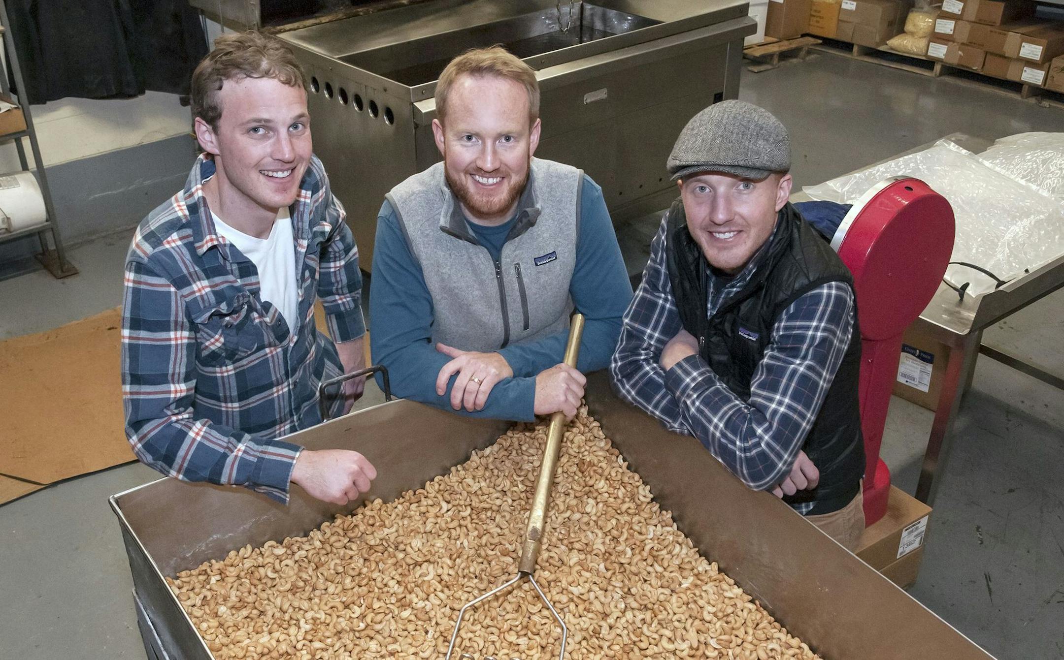 Jimmy, Michael and Tommy Burt with some freshly roasted cashews