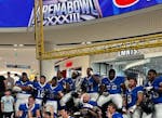 Players celebrate after ArenaBowl XXXIII