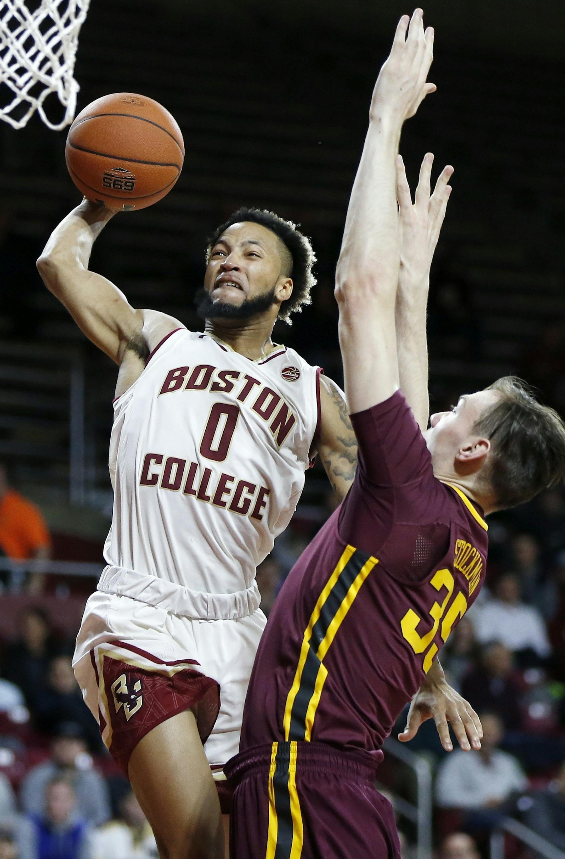 Boston College's Ky Bowman (0) shoots against Minnesota's Matz Stockman (35) during the first half of an NCAA college basketball game in Boston, Monday, Nov. 26, 2018. (AP Photo/Michael Dwyer)