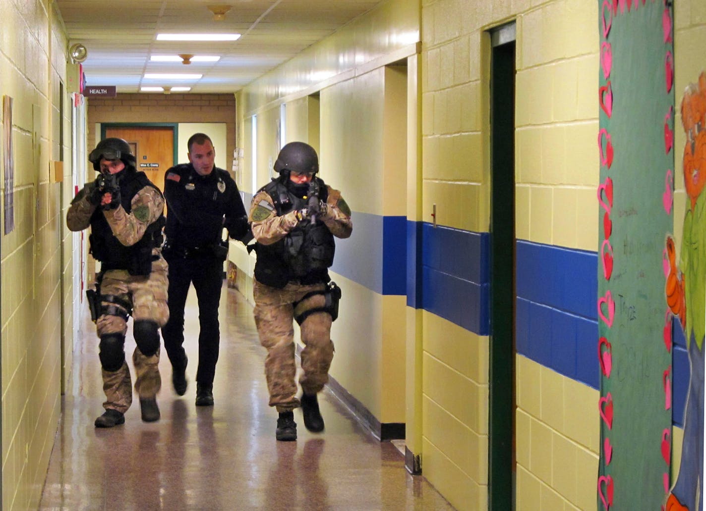 A school does an active-shooter drill in 2013. Today, classrooms in California are being outfitted with port-a-potties for use during lockdowns.