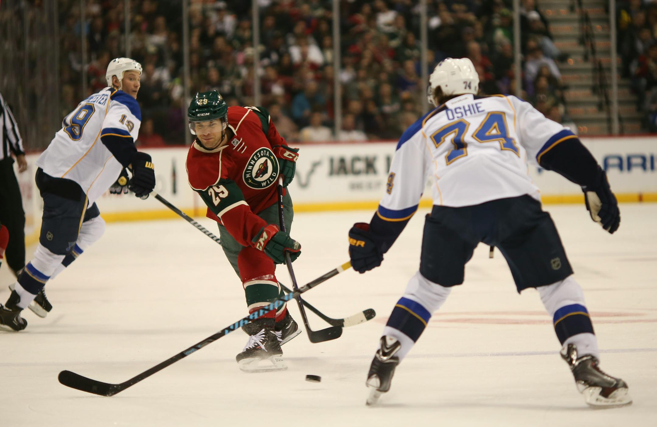 Wild winger Jason Pominville took a first-period shot, which was blocked by St. Louis' T.J. Oshie (74).