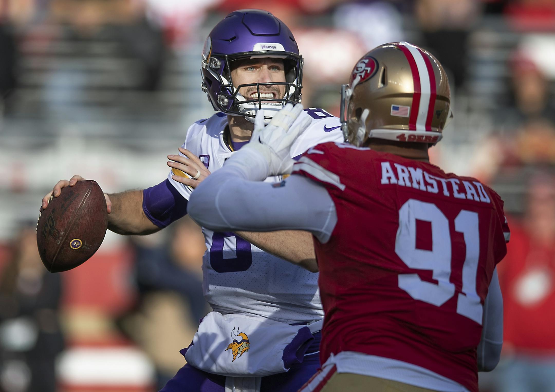 Minnesota Vikings quarterback Kirk Cousins was pressured by San Francisco 49ers defensive end Arik Armstead before he sacked Cousins during the second quarter.