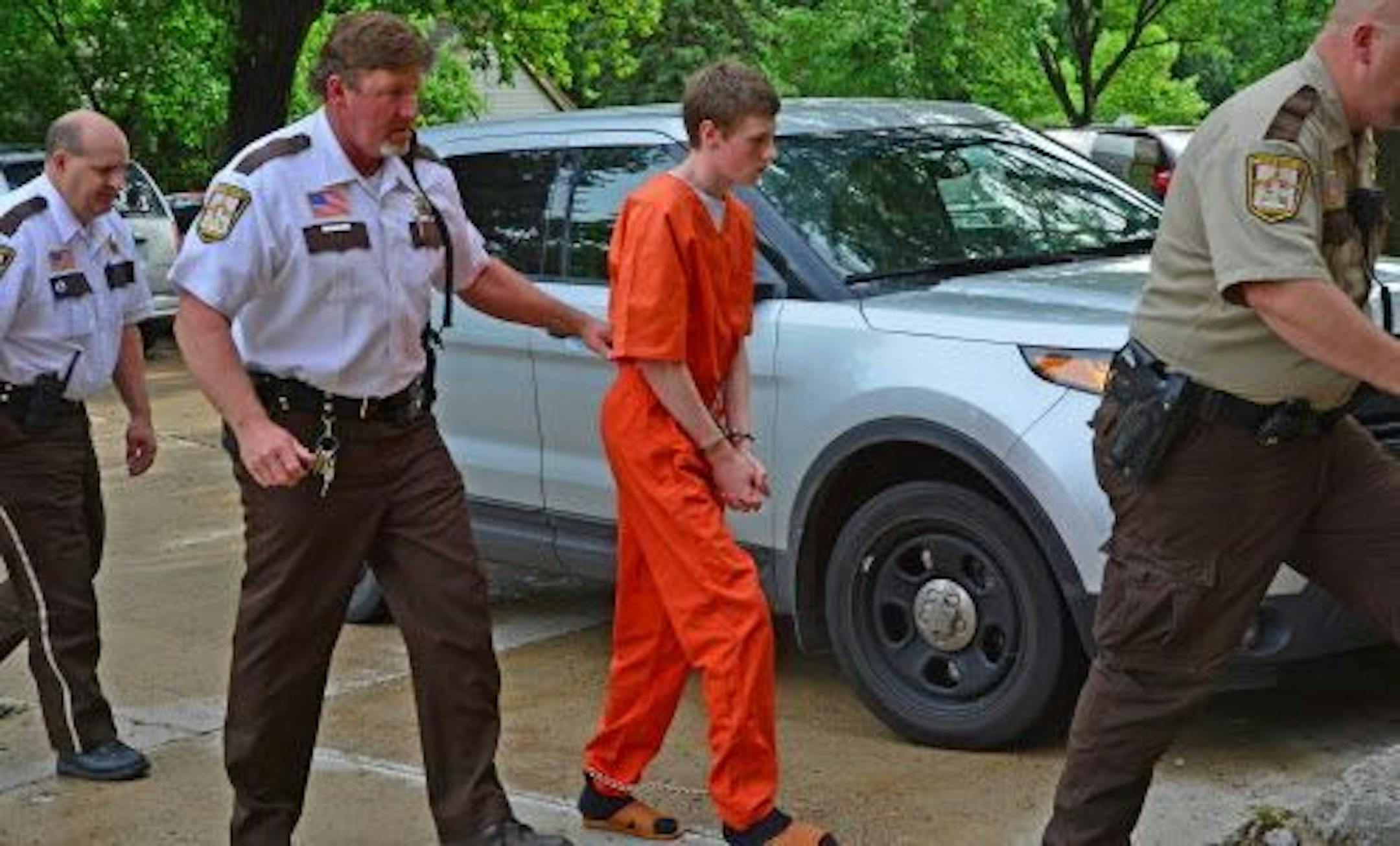 John LaDue, accused of plotting an attack on a Waseca school, was transported by Waseca County Sheriff's deputies to Waseca County Court for a morning hearing.