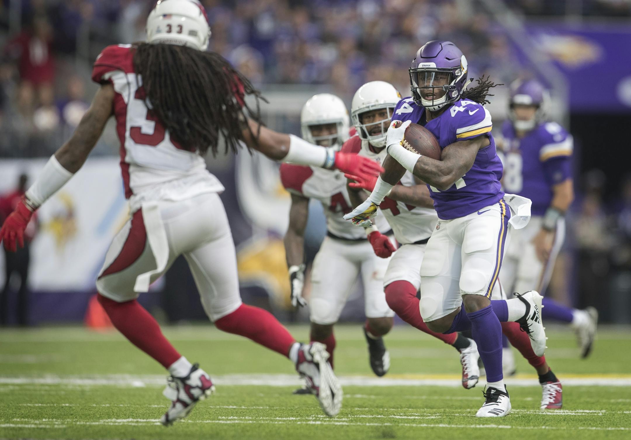 Minnesota Vikings running back Mike Boone (44) pickup a first down in the third quarter at U.S. Bank Stadium Sunday October 14, 2018 in Minneapolis, MN.